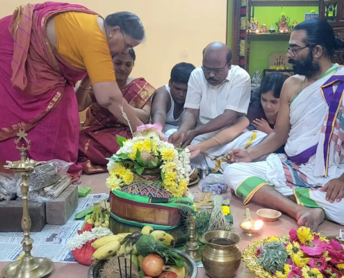 Pandit performing traditional pooja in clients premise as part of our astrology services